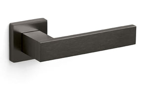 Black door handle on a white background