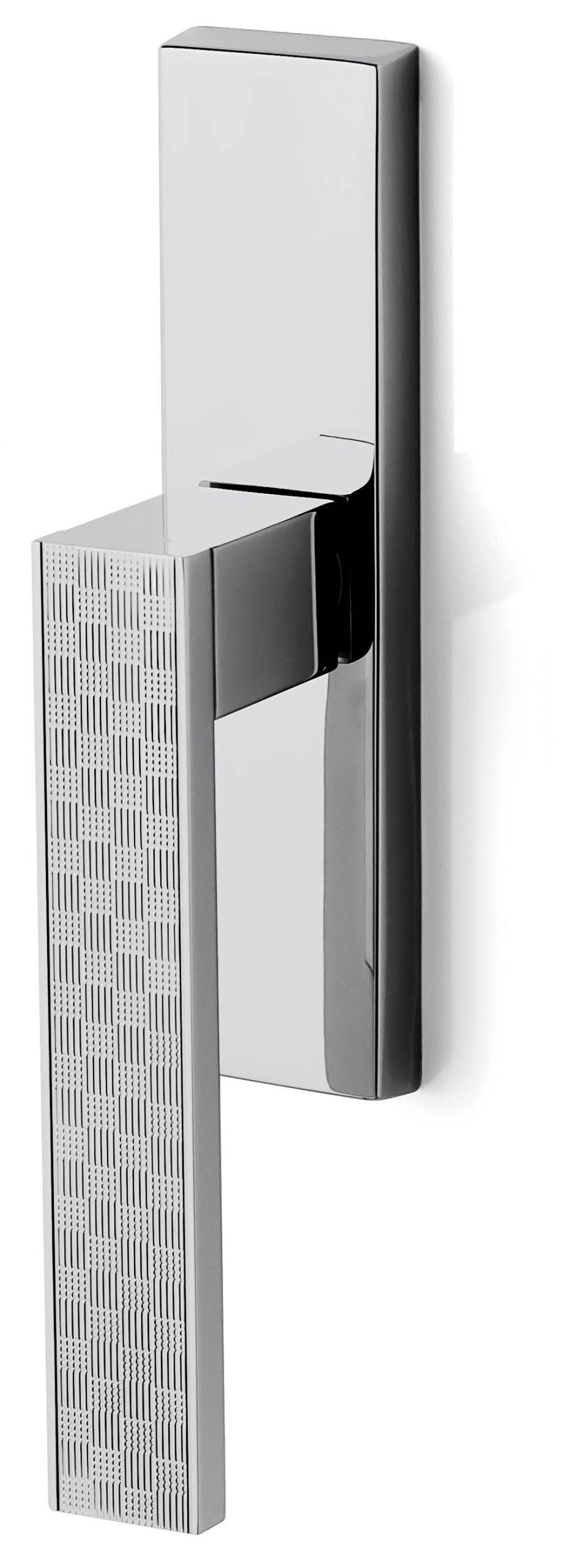 Chrome door handle with textured side on a white background