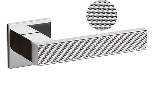 Chrome towel bar with textured surface on a white background