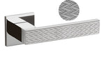 Chrome towel bar with textured end cap on a white background