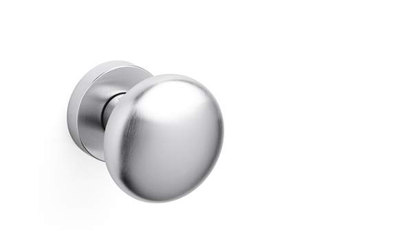 Stainless steel door handle on a white background