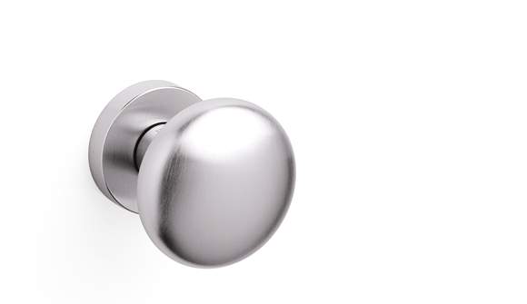 Metallic door handle on a white background