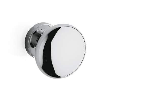 Polished chrome door knob on a white background