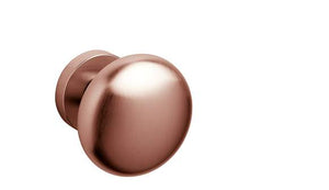 Rose gold door handle on a white background