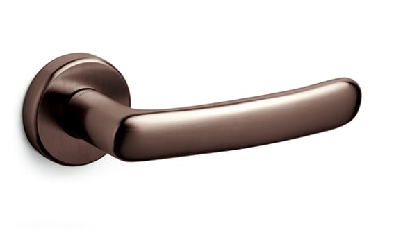 Bronze door handle on a white background