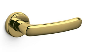 Gold door handle on a white background