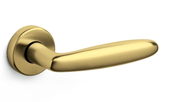Gold door handle on a white background