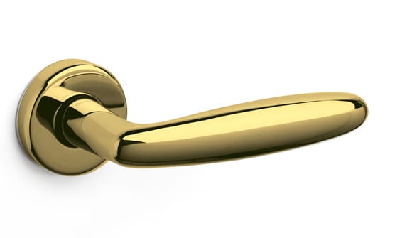 Gold door handle on a white background