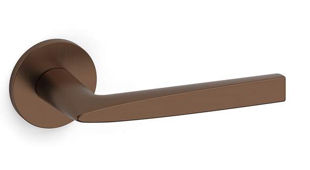Bronze door handle on a white background