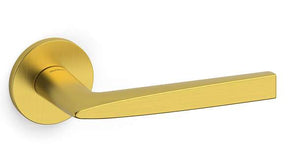 Gold door handle on a white background