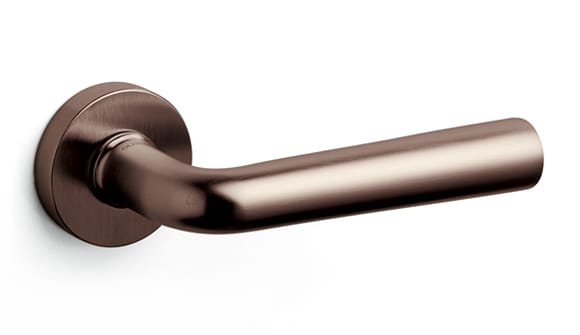 Bronze door handle on a white background