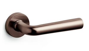 Bronze door handle on a white background