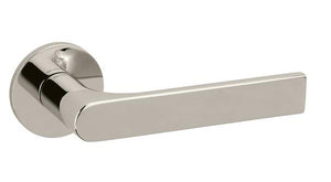 Polished metal door handle on a white background
