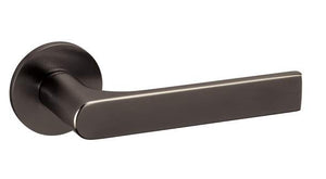 Metal door handle on a white background