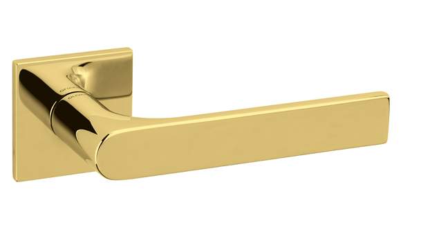 Gold door handle on a white background