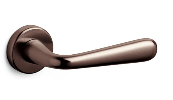 Bronze door handle on a white background