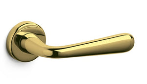 Gold door handle on a white background