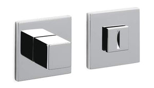 Two chrome square door handles on a white background