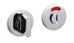 Chrome bathroom fixtures with a red indicator light on a white background