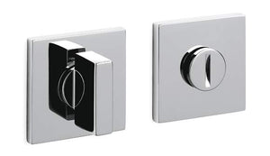 Two chrome door handles on a white background