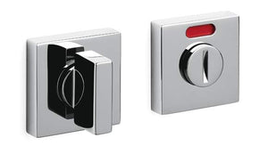Two metallic door handles on a white background