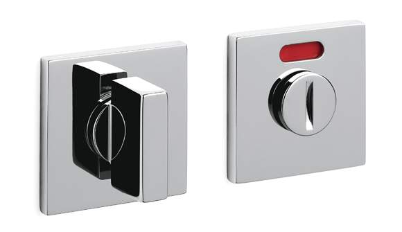 Two metallic control panels with knobs on a white background