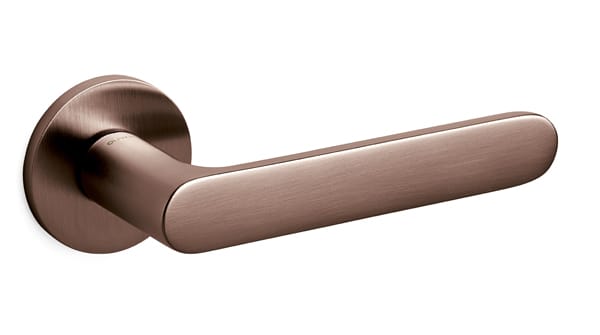 Bronze door handle on a white background