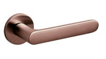 Rose gold door handle on a white background