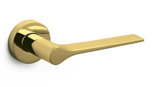 Gold door handle on a white background
