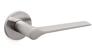 Stainless steel door handle on a white background