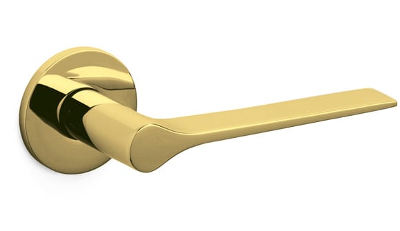 Gold door handle on a white background