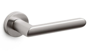 Stainless steel door handle on a white background