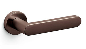 Bronze door handle on a white background