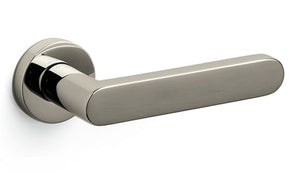 Metallic door handle on a white background