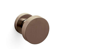Bronze door handle on a white background