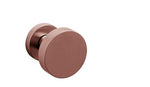 Rose gold door handle on a white background