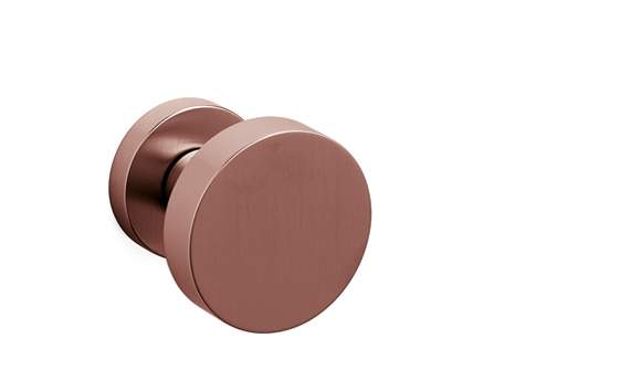 Rose gold door handle on a white background