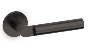 Black door handle on a white background