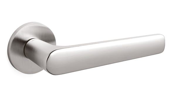 Metallic door handle on a white background