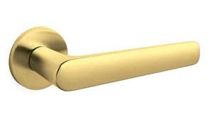 Gold door handle on a white background