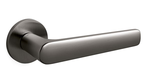 Metal door handle on a white background