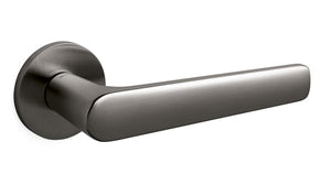 Metal door handle on a white background