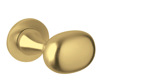 Gold door handle on a white background