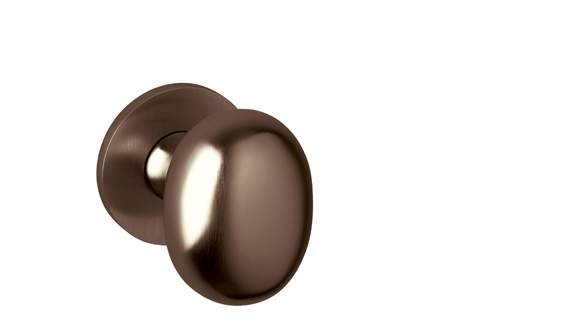Bronze door handle on a white background