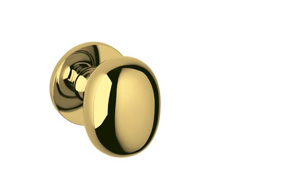 Gold door handle on a white background