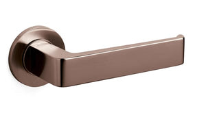 Bronze door handle on a white background