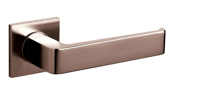 Bronze door handle on a white background