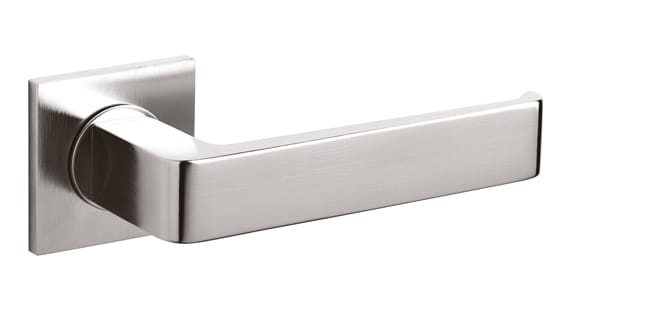 Metallic door handle on a white background
