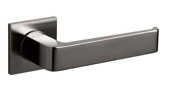Metal door handle on a white background