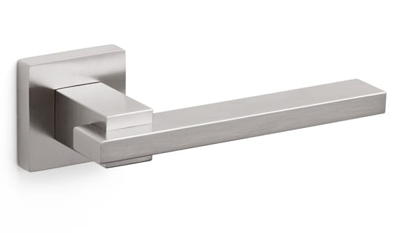 Metallic door handle on a white background